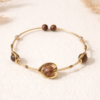 215040B5-7855-441A-AE60-8BE58D37FD28 bracelet seul doré coeur et bois de santal